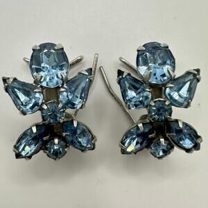Judith McCann 1940s vintage silver tone blue rhinestones wingback clip earrings